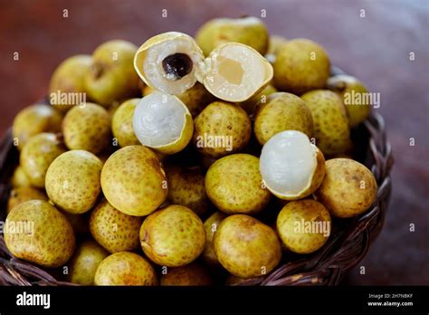 Group Of Longan Fruit In Wicker Basket Stock Photo Alamy