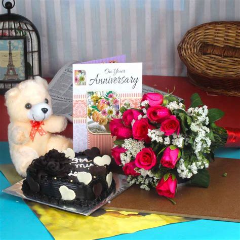 Paired with flowers, chocolates and more these teddy bears are the fun gift available for delivery for every occasion! Anniversary Roses Bouquet And Chocolate Cake With Teddy ...