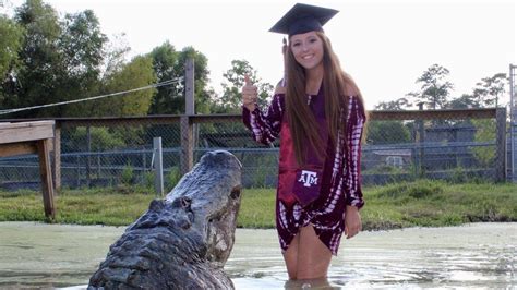 Texas Student Poses With Alligator In Graduation Snaps Bbc News