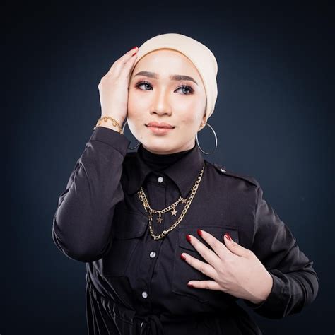 premium photo portrait of a beautiful asian muslim female model wearing stylish casualwear