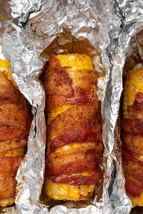 But you know where else, other than an actual grill, you can grill corn? BBQ Bacon Oven Roasted Corn | RecipeLion.com