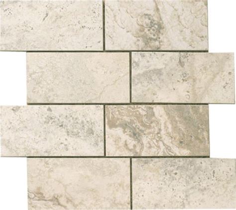 As shown in the accompanying photo, the backsplash for this tile counter is made of a horizontal how to tile a kitchen backsplash? Epoch Tile Gray Travertine Ceramic Floor or Wall Tile 12" x 12" at Menards | Travertine tile