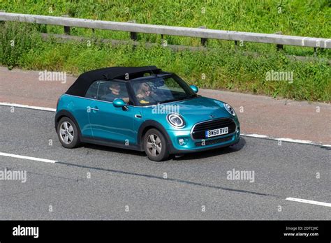 2018 68 Turquoise Mini Cooper Classic Vehicular Traffic Moving