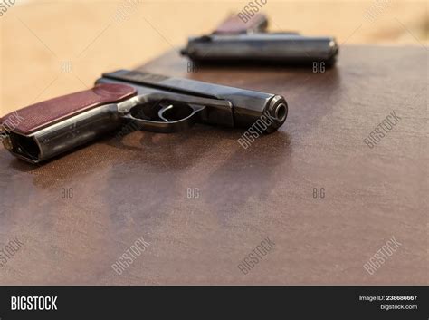 Pistol Lies On Table Image And Photo Free Trial Bigstock
