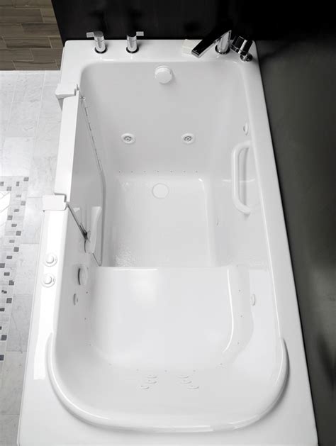 Placed in the tub and inflated there, the bath cushion seat gently lowers your elderly parent into the bath and raises them back when required, all a bath transfer bench (also known as a shower bench) is for people who have difficulty getting into the actual bath tub (or would have trouble standing in a. Elderly care home wisely opts for walk-in bathtubs ...