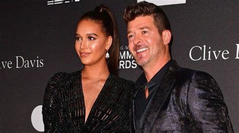 April Love Robin Thicke S Fiancee Reacts To Video Of Him Hugging Khloe Kardashian
