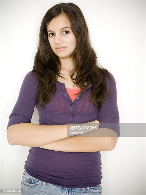 Teenage Girl With Arms Crossed Portrait High Res Stock Photo Getty Images