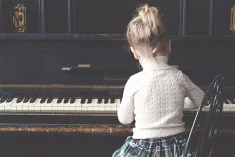 Cropped Kid On Piano
