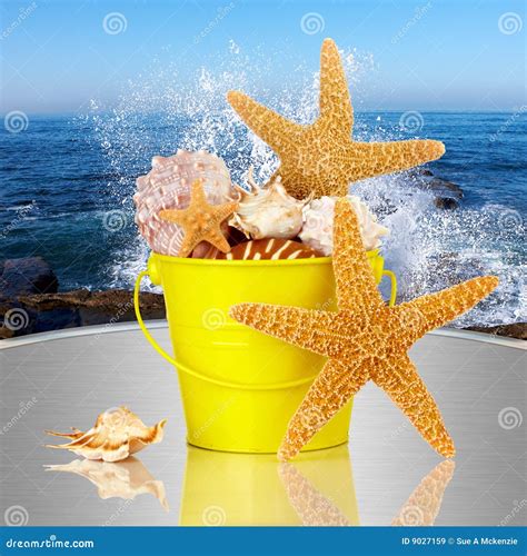 Starfish Sea Shells In Yellow Bucket Ocean Waves Stock Image Image