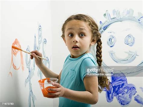 Girl Paints Wall Photos And Premium High Res Pictures Getty Images