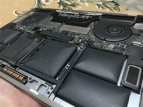 My 15 Inch Macbook Pro Late 2016 Battery Looks Swollen Should I Be