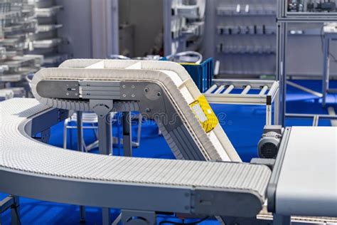 Industrial Manufacturing Conveyor Belt Roller Track System Stock Photo
