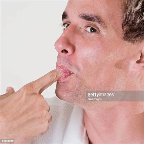 Man Finger Licking Photos And Premium High Res Pictures Getty Images