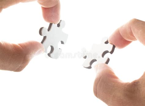 Businessman Team Work Holding Two Jigsaw Connecting Couple Puzzle Piece