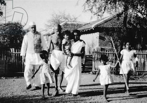 Image Of Mahatma Gandhi Walking With His Grand Daughter In Law Saraswati