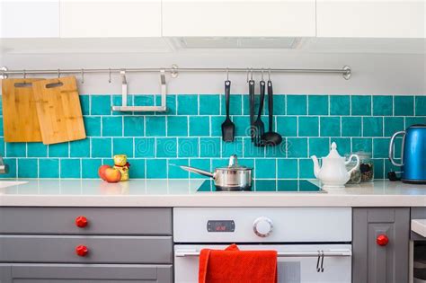 Further customize and enhance your kitchen's functionality with our wide range of cutting boards, cabinets, backsplashes and wall tiles, kitchen sinks, kitchen faucets, and installation accessories. Modern Gray Kitchen Features Dark Gray Flat Front Cabinets ...