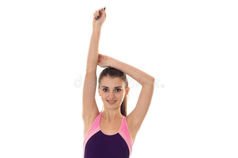 Young Beautiful Slender Girl In Body Swimsuit Raised Hands Up Stock