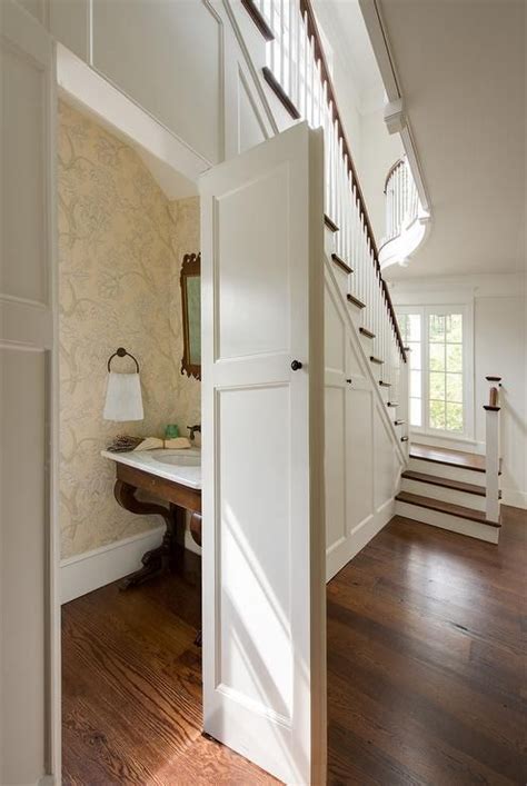 Rooms that are smaller tend to present their own set of challenges when it comes not all storage has to be easily accessible at all times. Concealed Powder Room Under The Stairs - Transitional ...