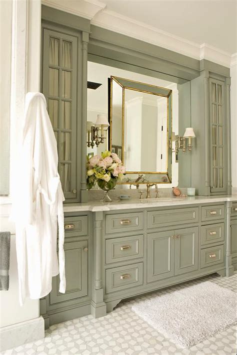 Some of the most reviewed products in green bathroom cabinets & storage are the home decorators collection windlowe 22 in. Green Gray Bathroom Vanity Cabinets with Gold Leaf Mirror ...