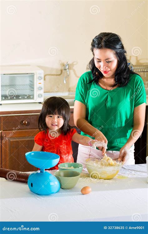 Asian Mother And Daughter At Home In Kitchen Stock Image Image Of Single Girl 32738635