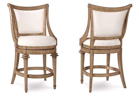 Their gentle curving backs and tuned legs look dainty. Pavilion Coastal Counter Height Swivel Stool With ...