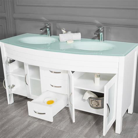 Spanning 60 wide, this generously sized piece showcases a carrara white marble countertop with two oval undermount sinks (made from white porcelain) so you have space to brush your teeth beside a buddy. Jersey City 60 inch White Double Sink Bathroom Cabinet ...