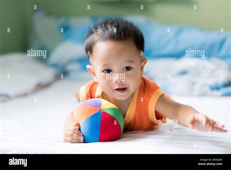 Boy Playing With Baby Hi Res Stock Photography And Images Alamy