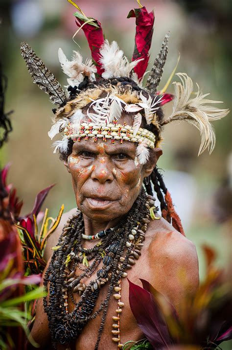 Old Papua Woman Wearing Shells And Feathers As Decoration Papua