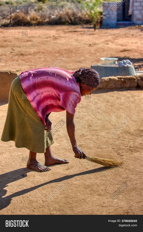 african woman broom image and photo free trial bigstock