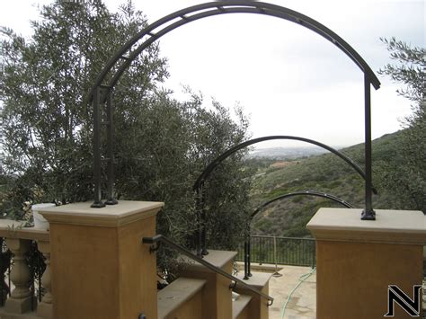 A trellis is a structure that is built with the intent being a framework for plants to grow on. Modern Gazebos & Trellises — Ornamental Iron Works | Ornamental Iron Works