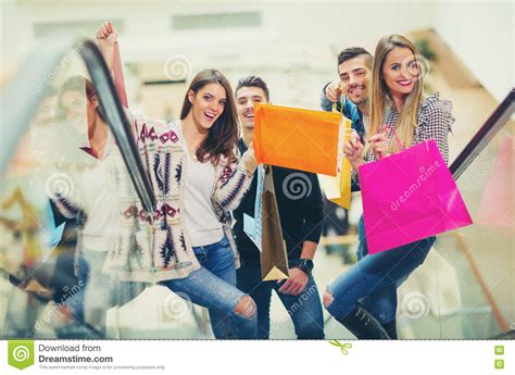 Group Of Friends Shopping In Mall Together Stock Image Image Of Shop