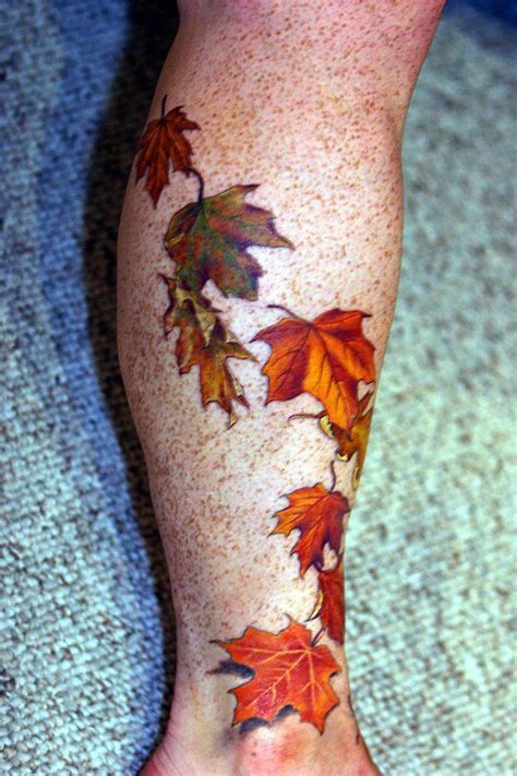 A Persons Leg With Leaves On It