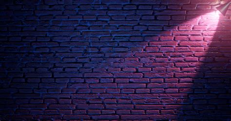 3d Rendering Brick Wall Illuminated By Neon Pink Light From Spotlights