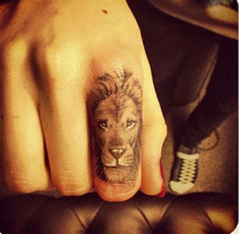 Lion Tattoo For My Bro Lion Tattoo On Finger Celebrity Tattoos Lion