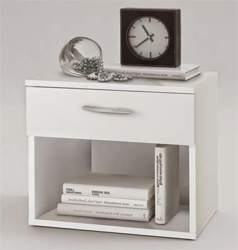 A bedside cabinet resembles a bedside table, but with drawers or a small cupboard door. Modern white Bedside table - 10 designs and ideas