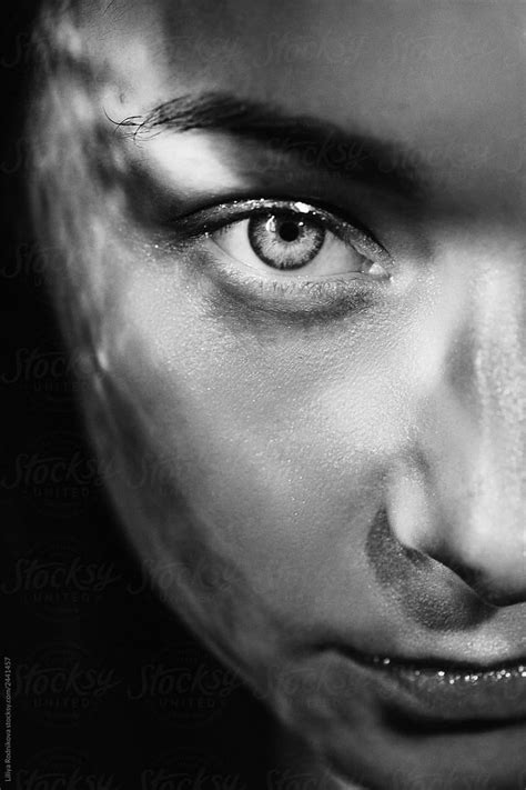 black and white half face beauty portrait by stocksy contributor liliya rodnikova stocksy