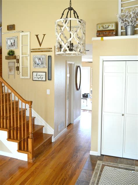 Consider a large pendant or from a entryway or half bath to a studio apartment, the right lighting can make all the difference. Updated Entryway: The Prettiest Chandelier - Little ...