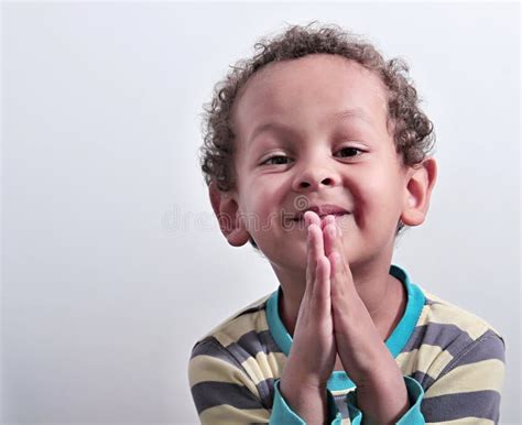 Little Boy Praying To God With Hands Together Stock Photo Stock Photo