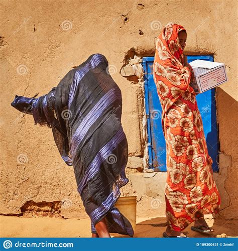 Sudanese Women In Typical Sudanese Clothes Shopping In A Small Village In The Desert Editorial