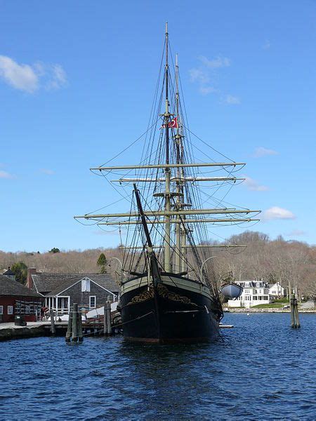 An Old Sailing Ship Docked In The Water