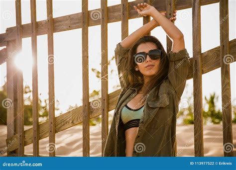 Beautiful Young Woman Posing Near A Wood Fence Stock Photo Image Of