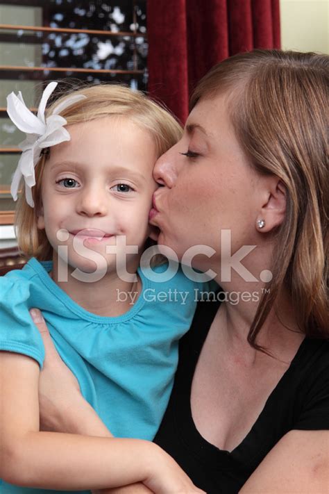 Mother Giving Babe A Kiss Stock Photo Royalty Free FreeImages