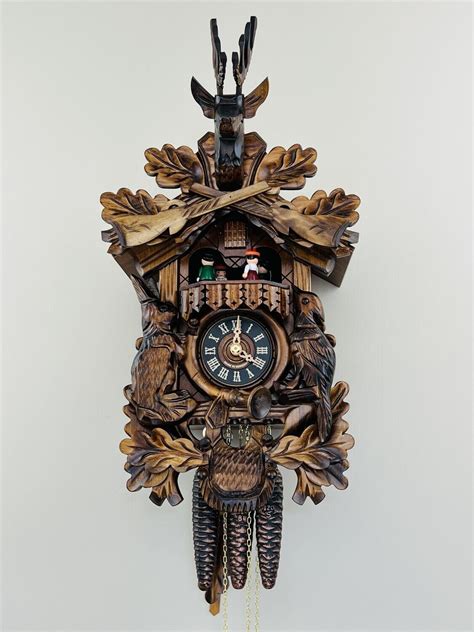 17 One Day Musical Hunters Cuckoo Clock With Dancers Hand Carved