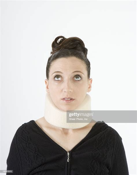 Woman Wearing Neck Brace Looking Up High Res Stock Photo Getty Images