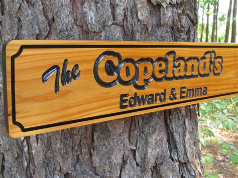 Carved Wood Sign With A Personalized Name Custom Signs