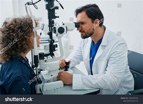 Male Optometrist Doing Sight Test Male Stock Photo 2192395755