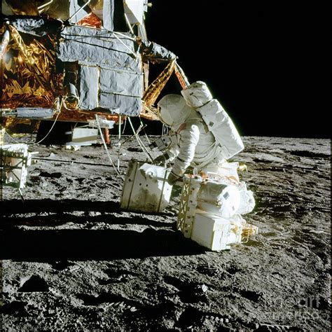 Apollo 12 Astronaut In Front Of Lunar Module Photograph By Nasascience