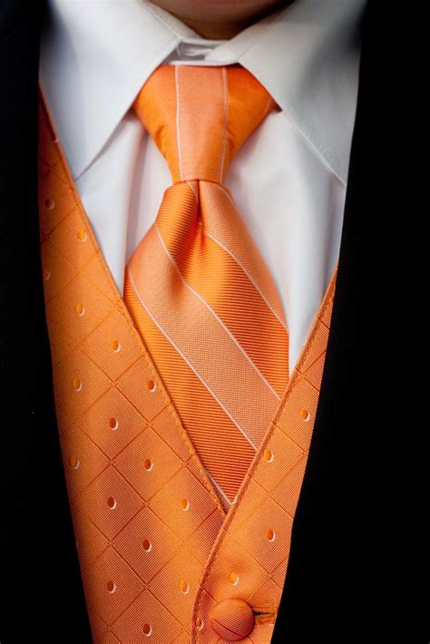 So you love black and have a wedding to go to, but you don't want to look like you're going to a funeral? Orange and Black Tux for prom | Orange wedding colors ...