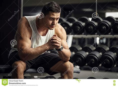 Thoughtful Serious Sportsman Sitting In A Gym Stock Image Image Of