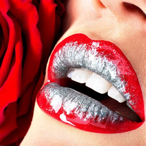 Beautiful Female Lips With Shiny Lipstick And Red Rose Stock Image